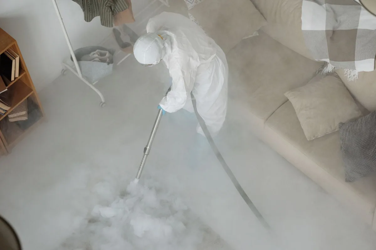Biohazard cleanup technician in protective equipment, Lloyd, Portland, OR